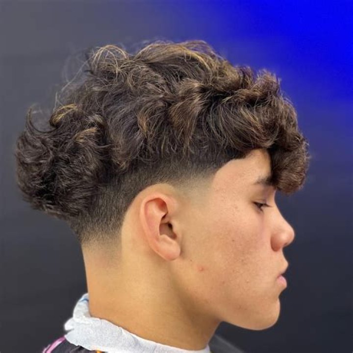 Achieve the Perfect Blowout Taper for Curly Hair: A Comprehensive Guide