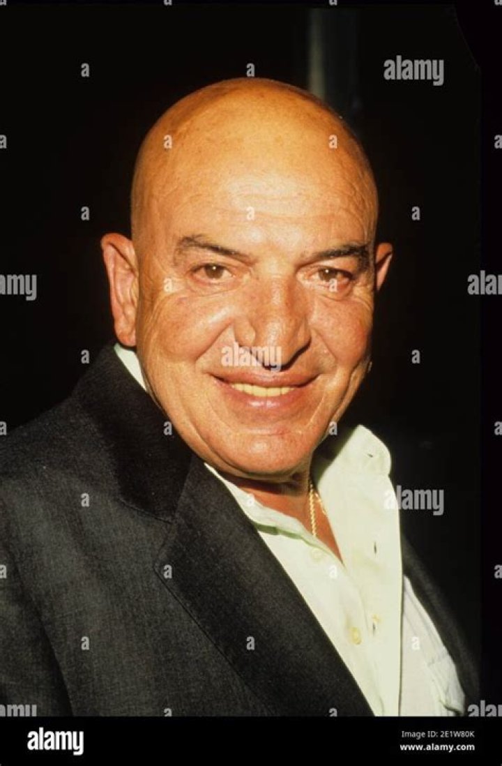 Discover the Towering Stature of Telly Savalas!