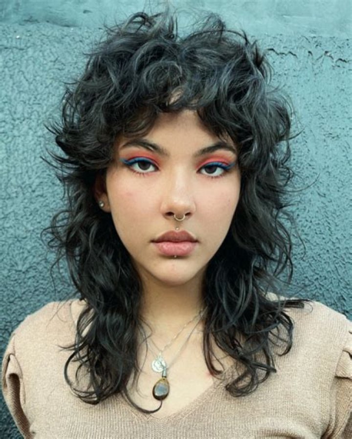 Embracing the Wild: The Allure of Wolf Cut Curly Hair